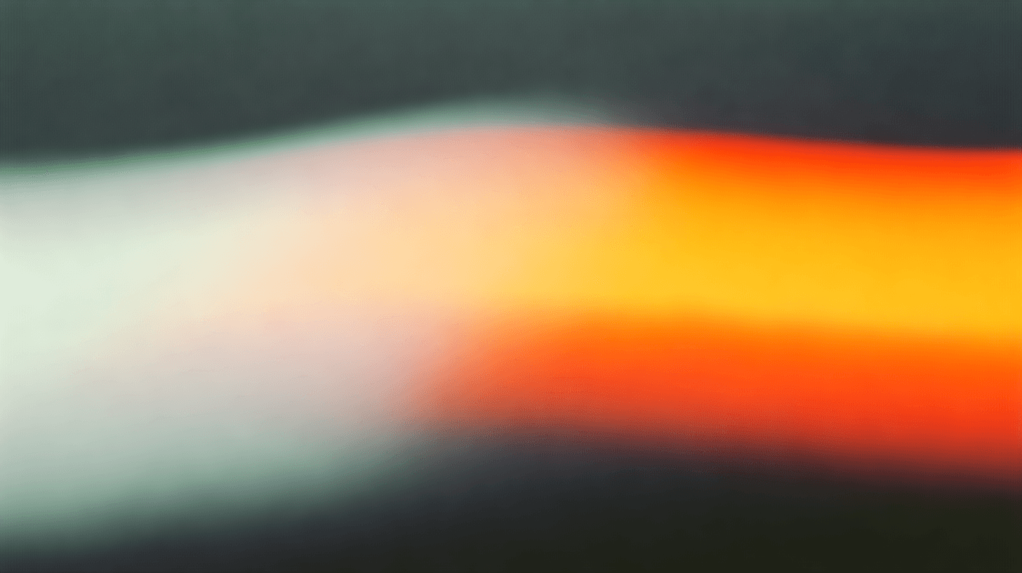 Abstract blur of warm colors transitioning from orange and yellow to cooler tones. The soft, out-of-focus composition creates a dreamy, atmospheric effect with flowing color gradients. (AI-generated image) by Sydney SG