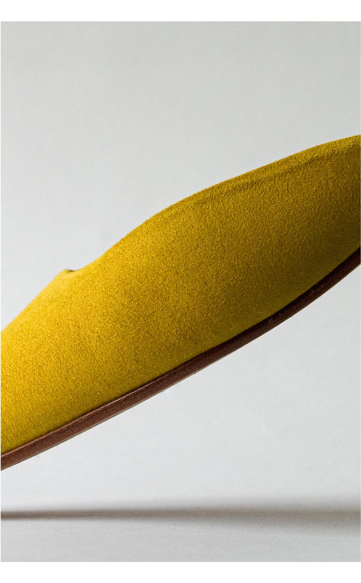  Personal Work
Close-up of a sulfer-yellow, suede mule from LOQ. by Sydney SG