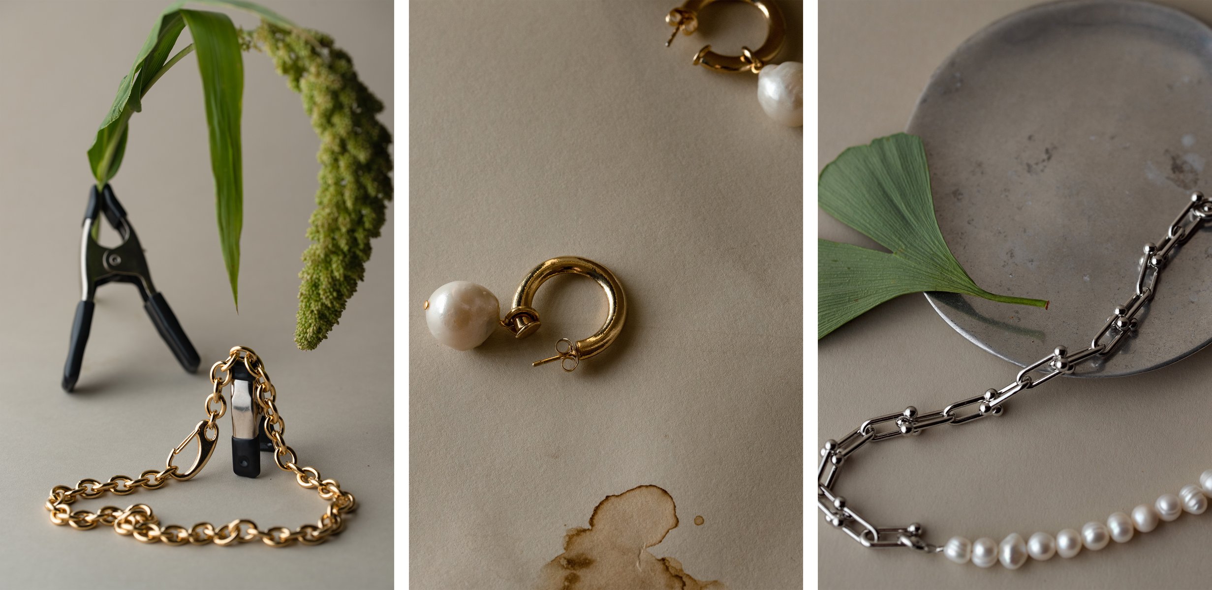  Triptych:

Left image: two black rubber and silver clamps - the larger clamp is supporting a green stem of amaranth that is leaning across the frame, the second clamp is draped with a large gold chain.

Center image: a close-up of two small, golden hoop earrings with pearls on a sheet stained, beige paper.

Right image: a silver Tiffany chain with pearls draped across a sheet of beige paper, next to a round pewter dish and a bright green gingko leaf. by Sydney SG