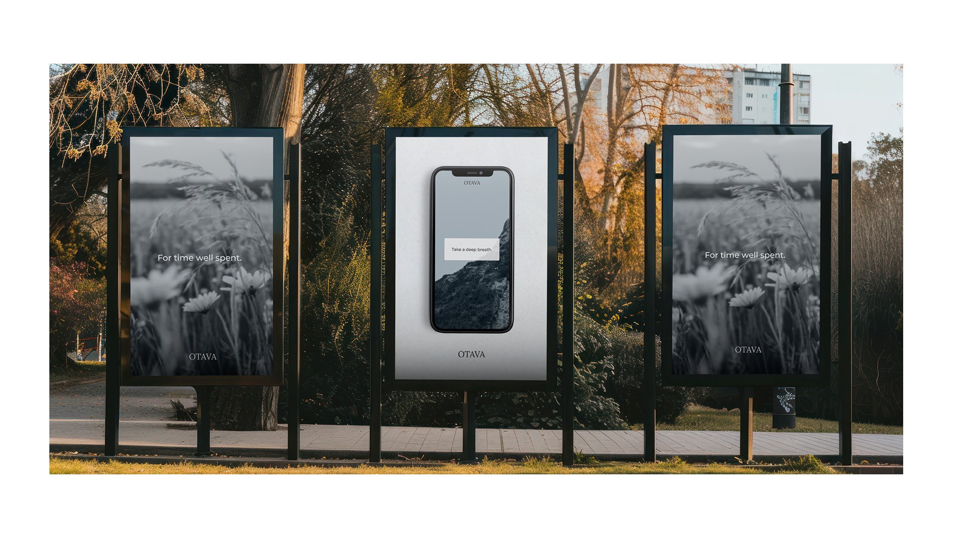 Outdoor display featuring three Otava ads: two showcasing a serene field of wildflowers with the tagline 'For time well spent,' and the center display highlighting a smartphone with the message 'Take a deep breath,' all set in a natural park environment. by Sydney SG